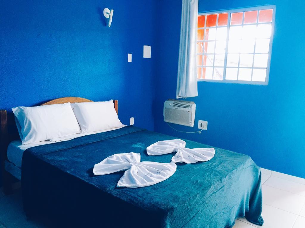 Residencial La Puerta Del Sol Hotel ปอร์โต จิ กาลินญาส ห้อง รูปภาพ